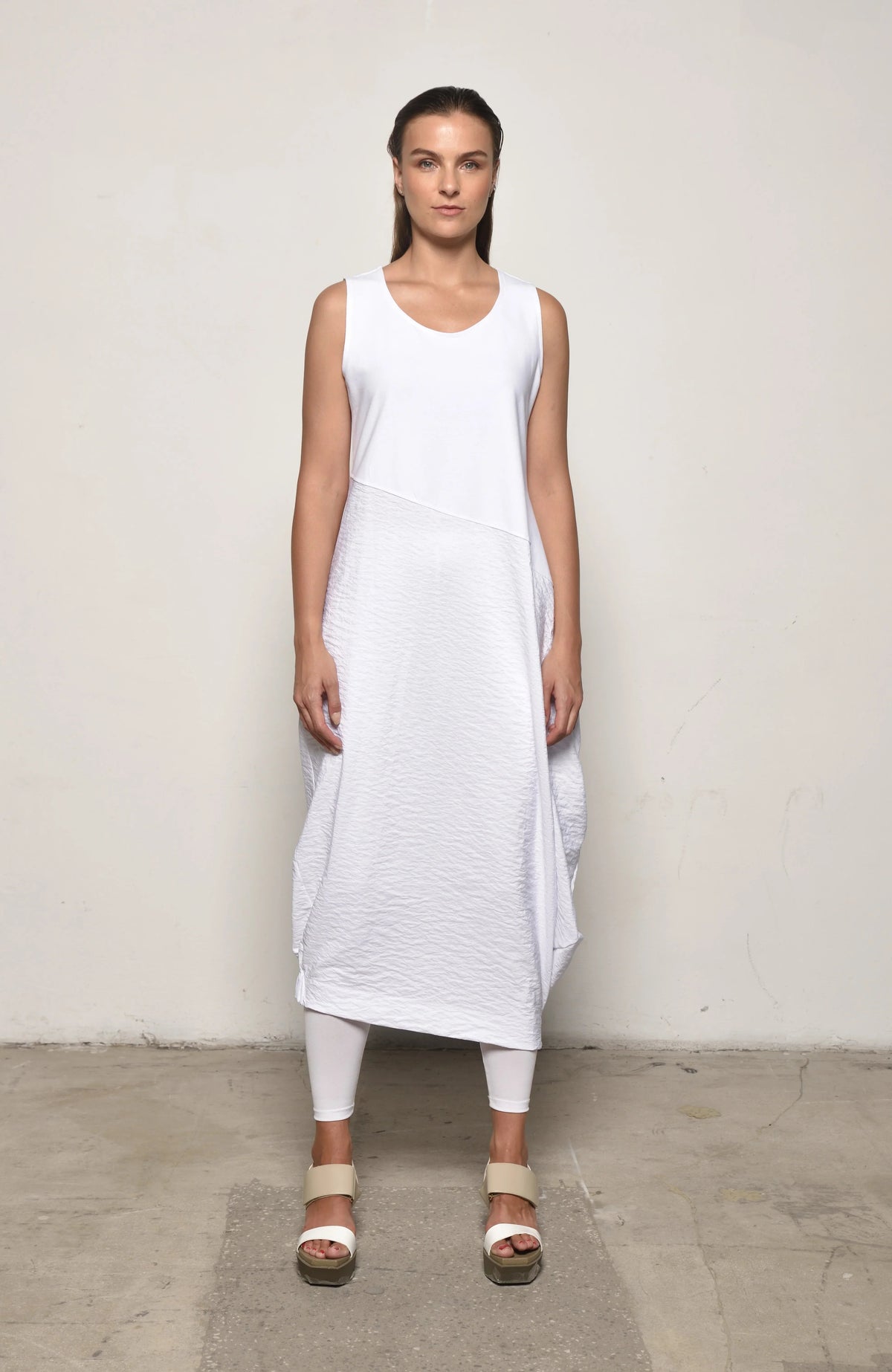 Sleeveless Babylon dress by SIMPLY MILA, modern women's dress with a stylish, sleeveless design and vibrant fabric detail.