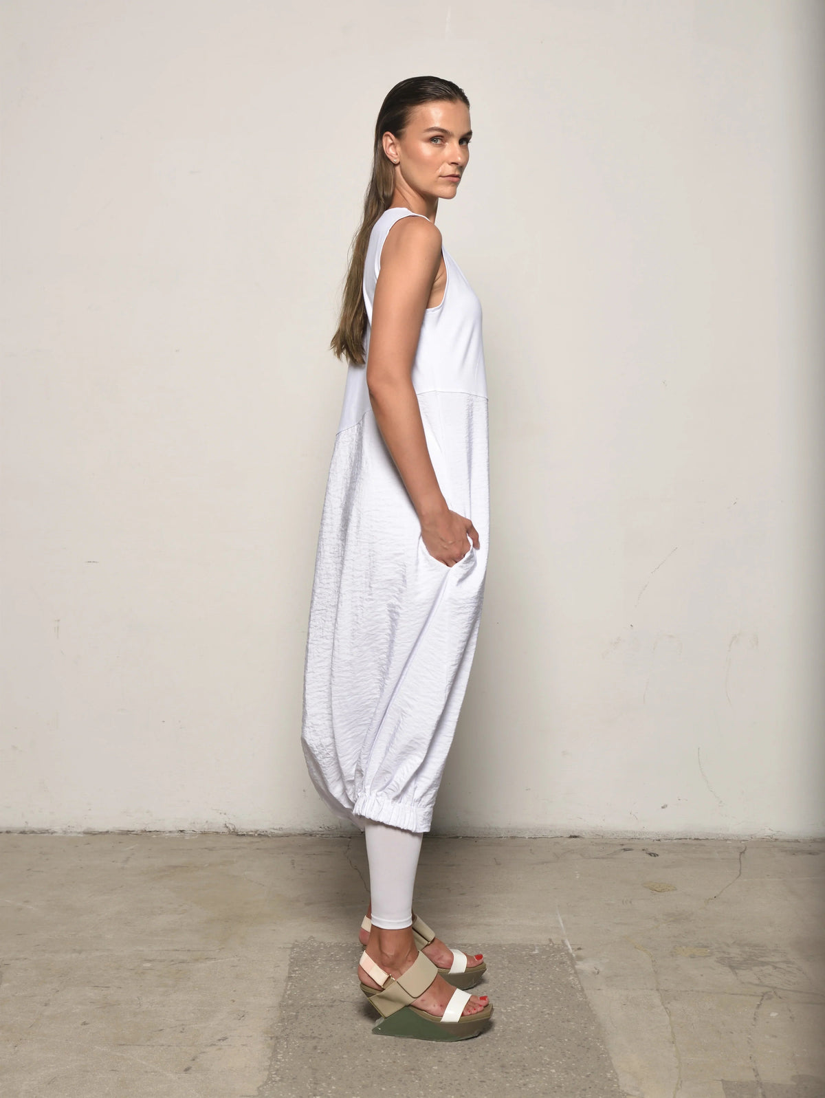 Sleeveless Babylon dress by SIMPLY MILA Modern Women's Clothing featuring a stylish design and flowing fabric.