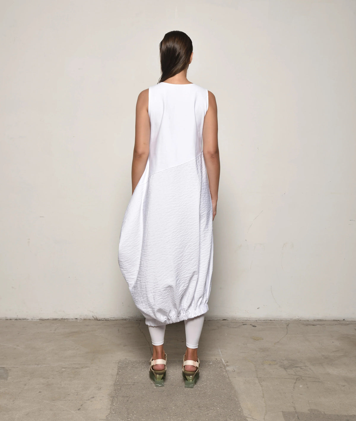 Sleeveless Babylon dress by SIMPLY MILA Modern Women's Clothing, featuring a stylish design and lightweight fabric.
