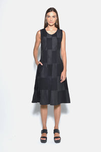 Sleeveless chessboard dress by SIMPLY MILA Modern Women's Clothing, front view showing black and white checkered pattern.