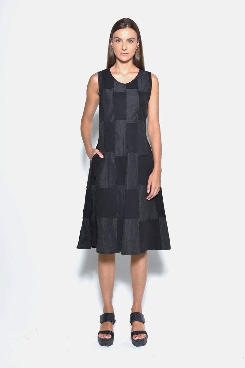 Sleeveless chessboard dress by SIMPLY MILA Modern Women's Clothing, front view showing black and white checkered pattern.