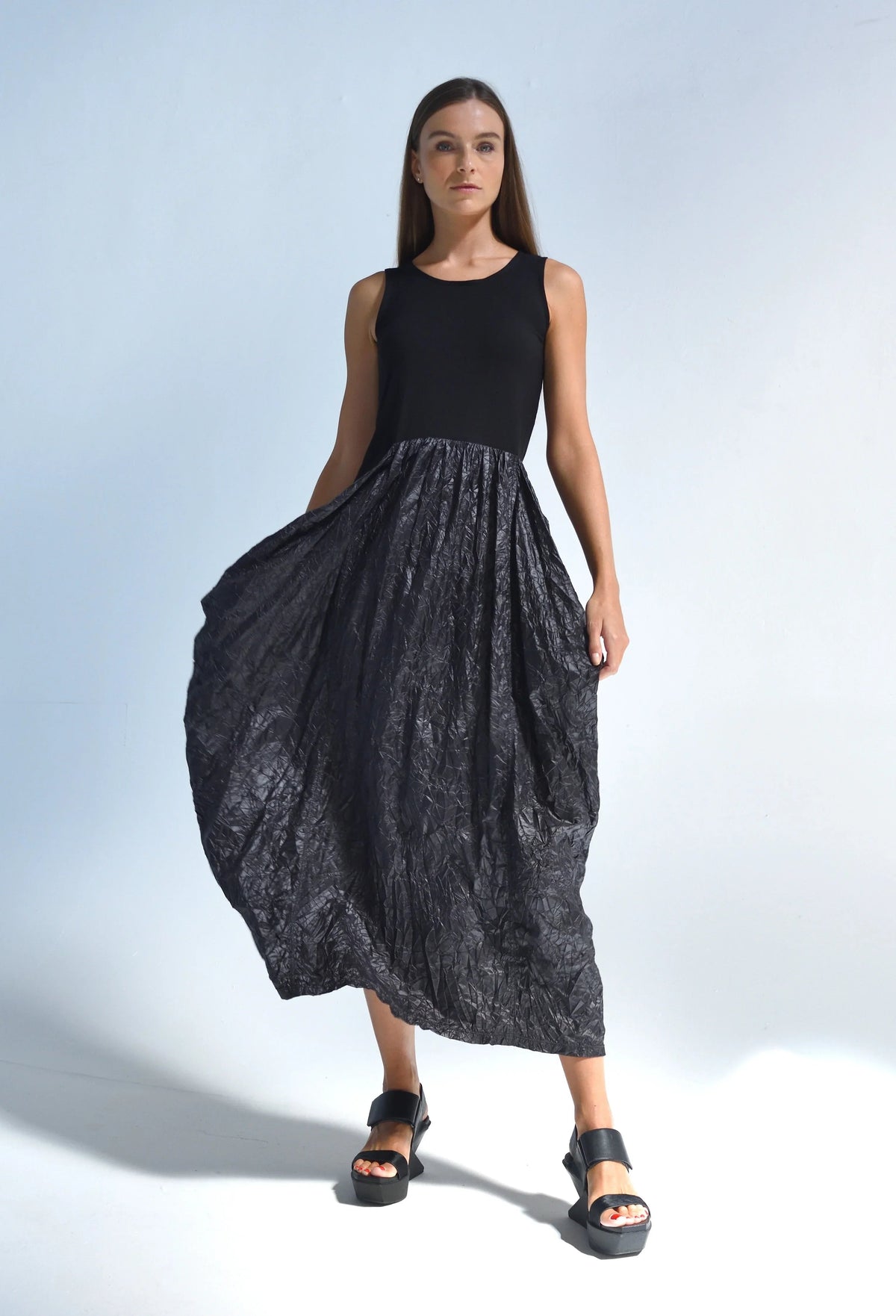 Sleeveless Hydra dress from SIMPLY MILA Modern Women's Clothing, featuring a stylish, flowy design perfect for warm-weather wear.