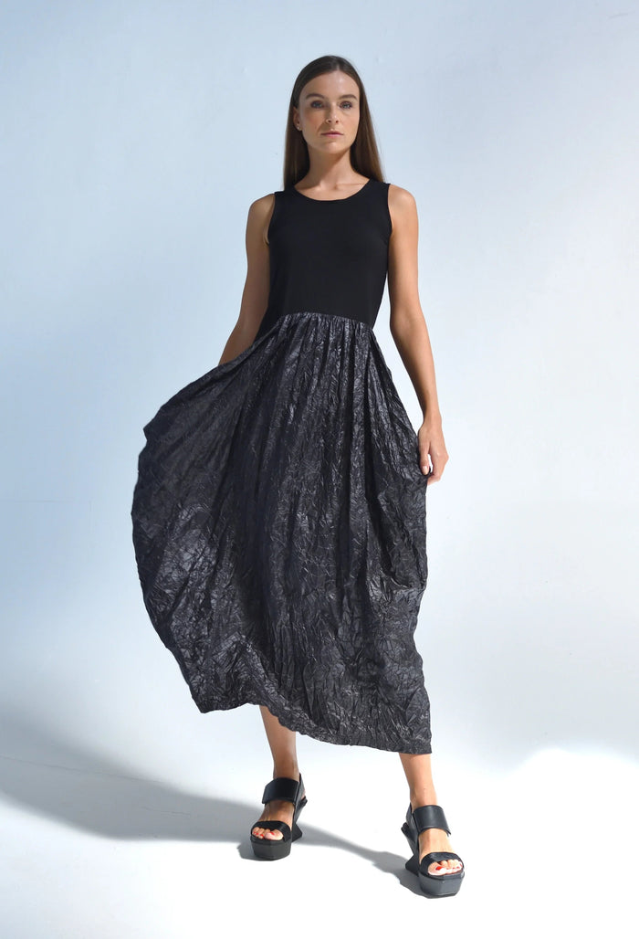 Sleeveless Hydra dress from SIMPLY MILA Modern Women's Clothing, featuring a stylish, flowy design perfect for warm-weather wear.