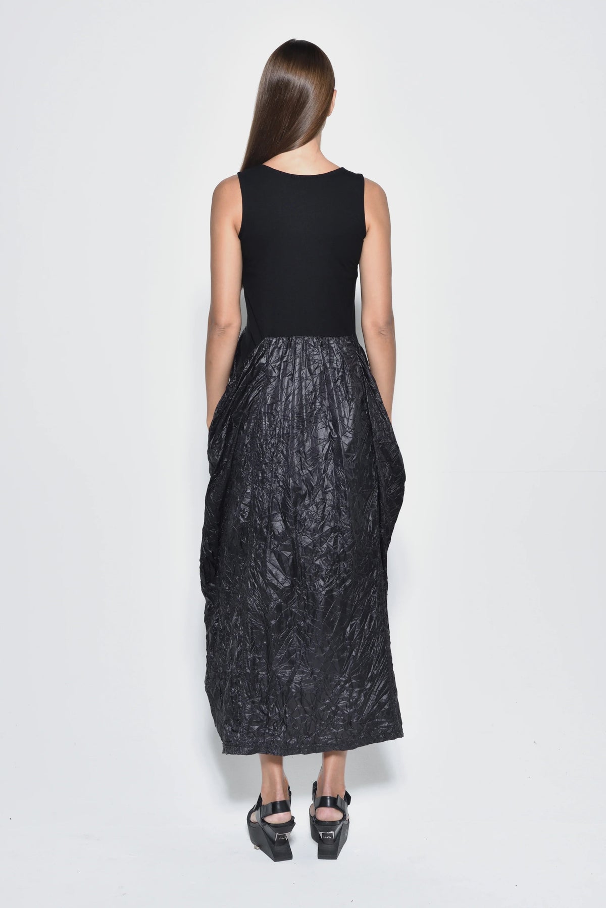 Back view of SIMPLY MILA Sleeveless Hydra dress for women, stylish modern dress with a sleek design.