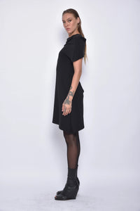 Side view of a sleeveless Selene dress by SIMPLY MILA Modern Women's Clothing, featuring a sleek design and lightweight fabric.