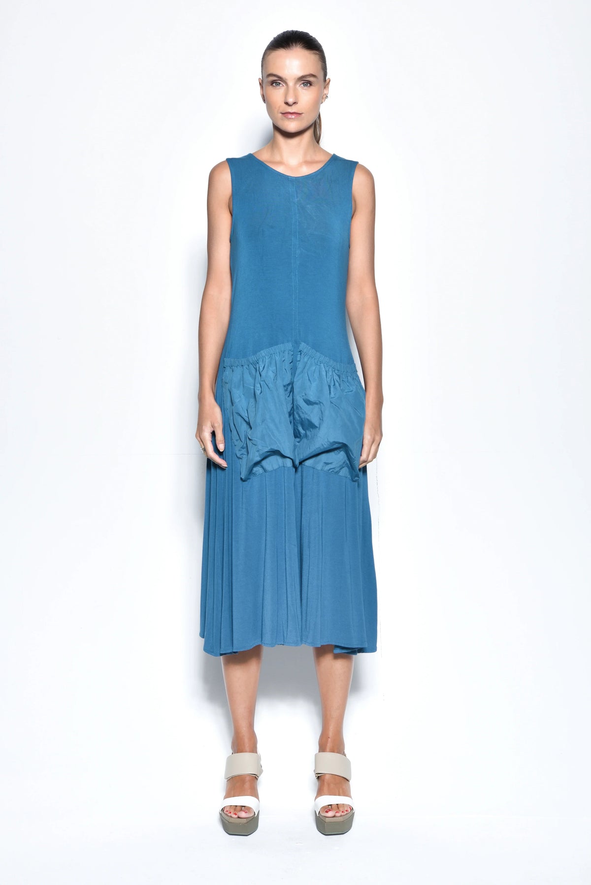 Dark ink Pocket Bags dress by SIMPLY MILA Modern Women's Clothing, featuring a stylish design and functional pockets.