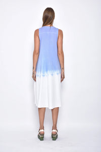 Back view of the Maia Ombre dress by SIMPLY MILA Modern Women's Clothing, featuring a flowing design with a gradient ombre pattern.