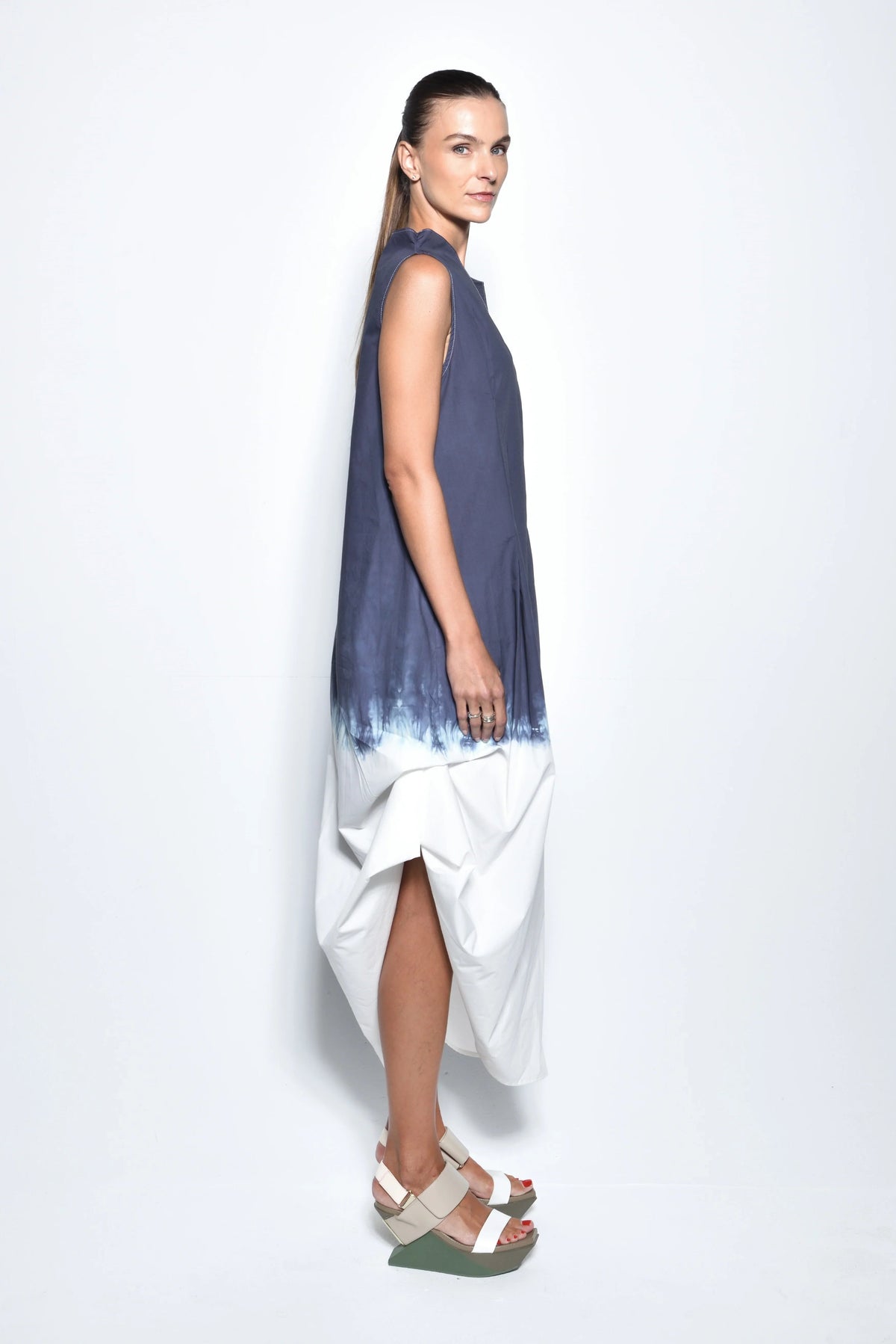 Side view of a SIMPLY MILA Ombre Imperial dress for women, featuring a flowing design and gradient color pattern.