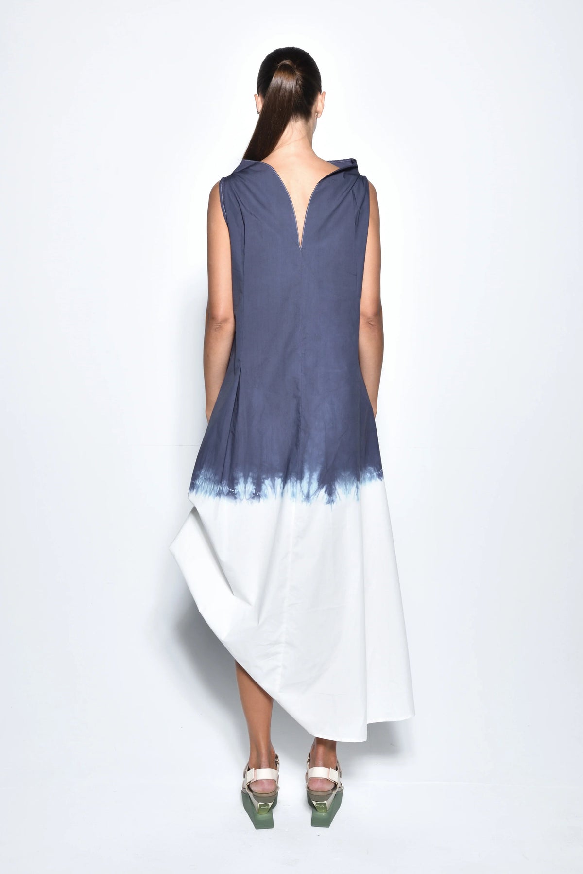 Back view of a SIMPLY MILA Modern Women's Clothing Ombre Imperial dress, flowing fabric with gradient color design.