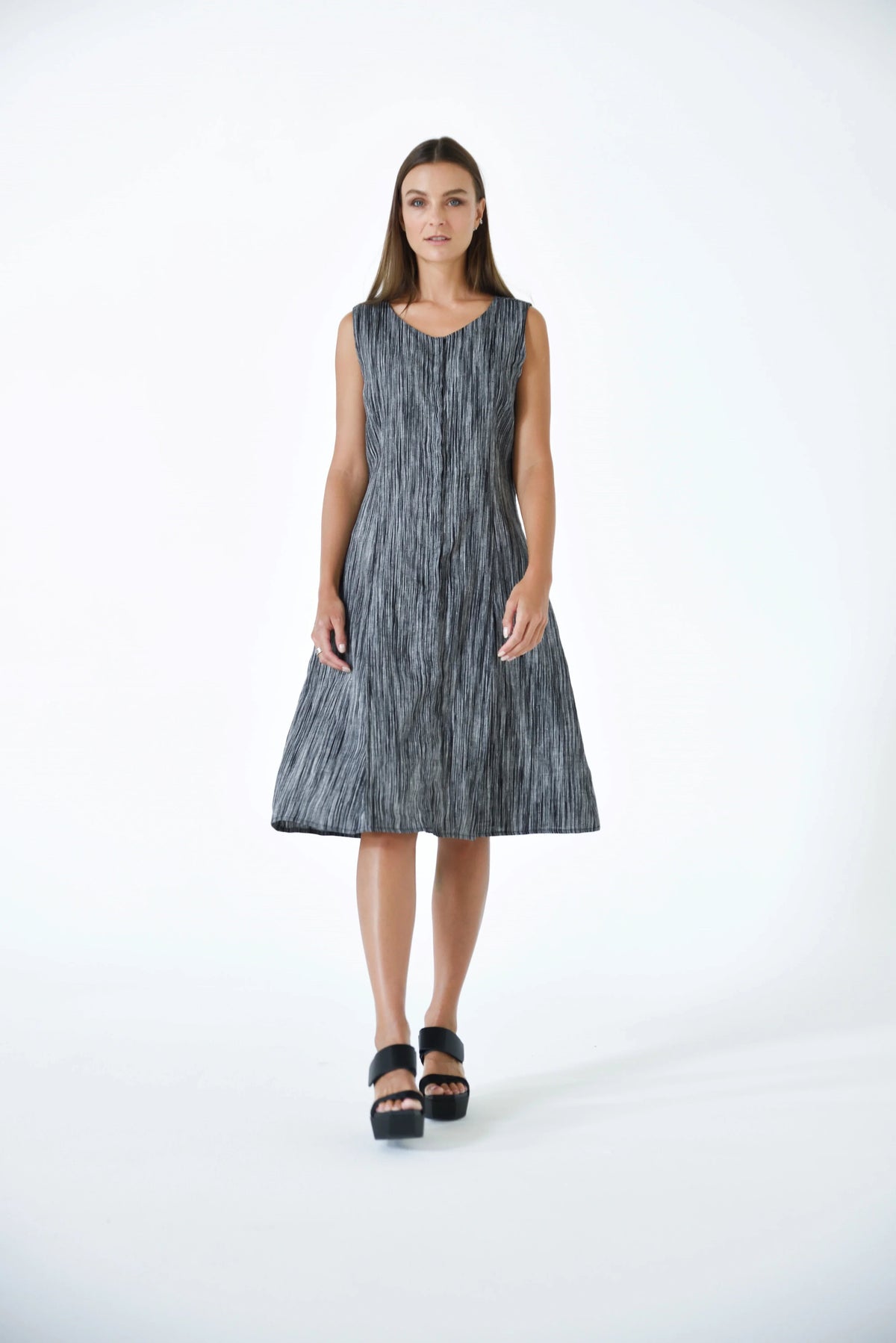 Light blue Lisbon Dress by SIMPLY MILA, modern women's dress with a flowing silhouette and stylish design, displayed on a hanger.