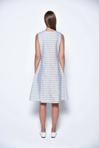 Back view of a stylish Lisbon Dress by SIMPLY MILA, a modern women's dress with a flattering fit and elegant design.
