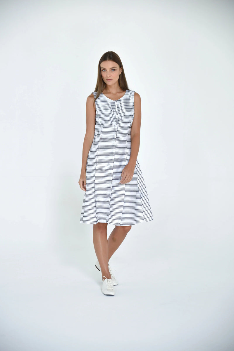 Elegant Lisbon dress by SIMPLY MILA, featuring a stylish modern women's dress with a flattering fit and vibrant design.