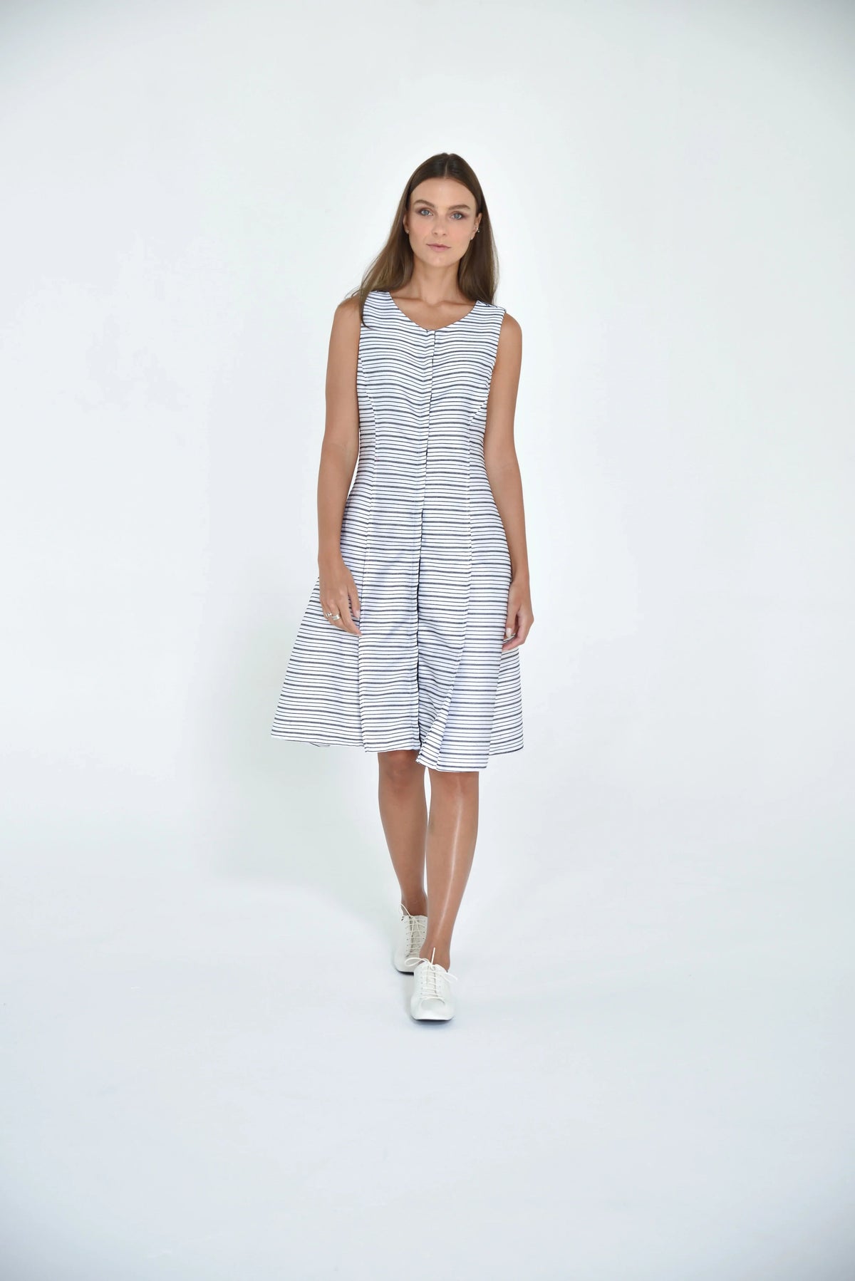 Elegant Lisbon Dress by SIMPLY MILA, modern women's dress with a stylish design, shown in a well-lit image.