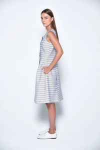 Side view of the Lisbon Dress by SIMPLY MILA, a stylish modern women's dress in soft fabric, perfect for casual or semi-formal wear.