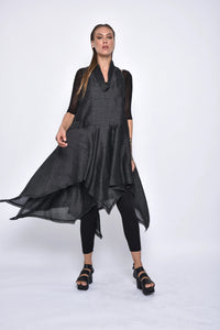 Simply Mila Juno dress, modern women's dress in soft fabric with a relaxed fit, displayed on a hanger.
