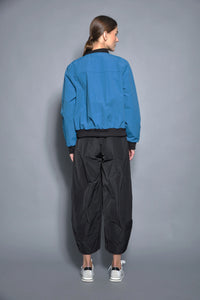 Modern women's SIMPLY MILA baseball jacket with a classic design and casual fit, shown in a stylish front view.