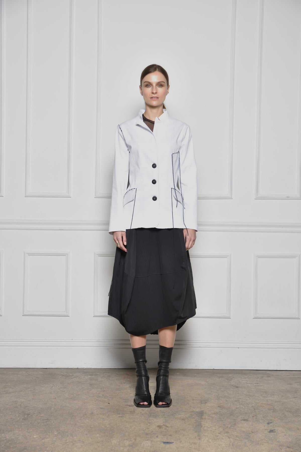 Simply Mila modern women's Baste Stitch jacket, lightweight jacket with stylish stitching details, shown on a model.