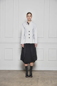 Simply Mila modern women's Baste Stitch jacket, lightweight jacket with stylish stitching details, shown on a model.