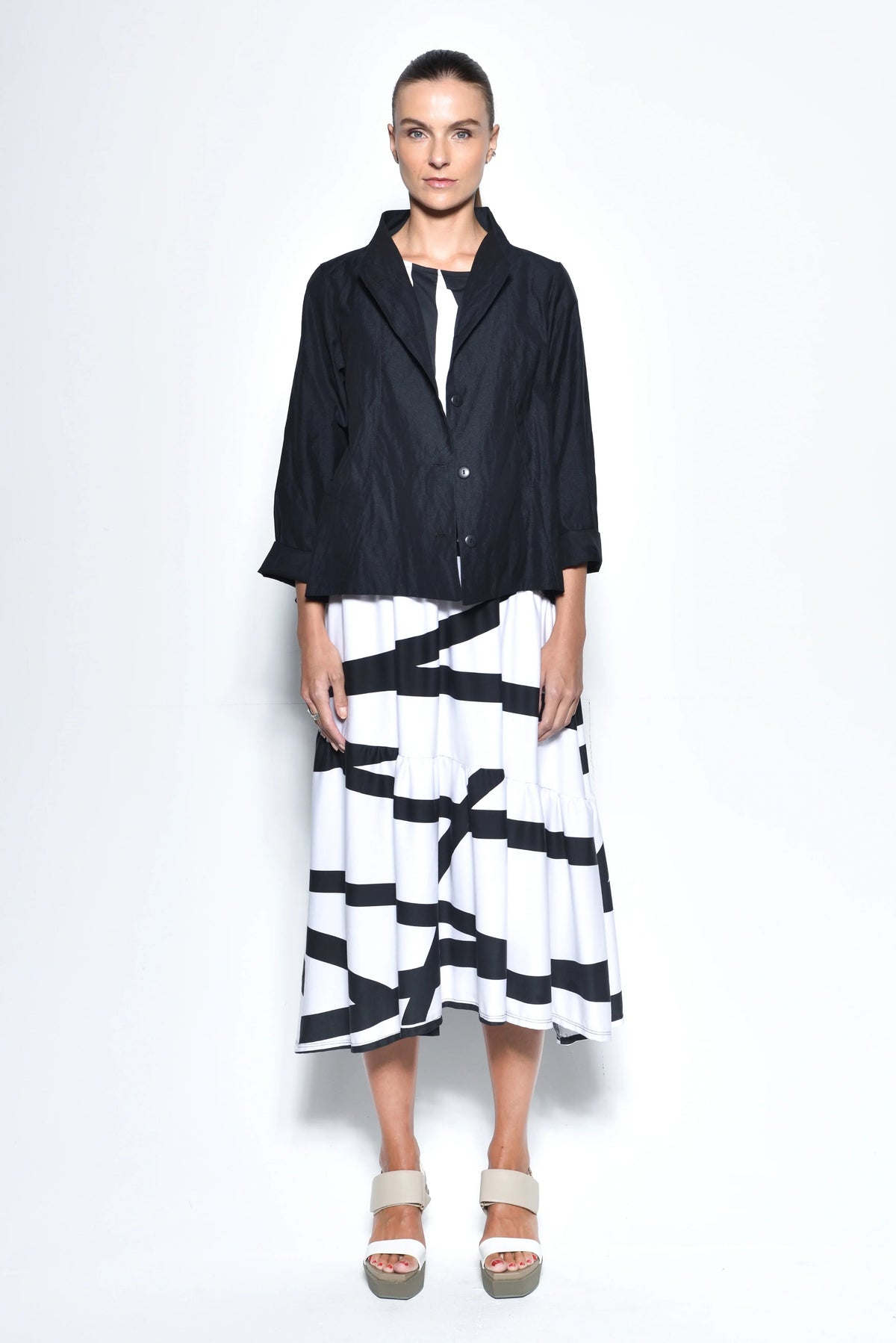 Black Tokyo Jacket by SIMPLY MILA, modern women's outerwear with sleek design and comfortable fit.