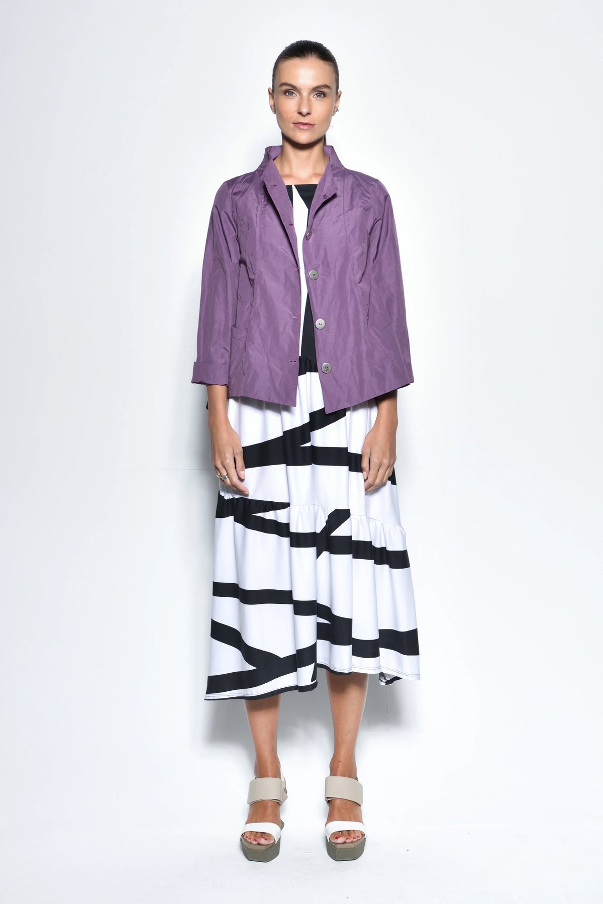 Light gray Tokyo Jacket by SIMPLY MILA, modern women's jacket with a stylish fit and casual design, shown on a hanger.