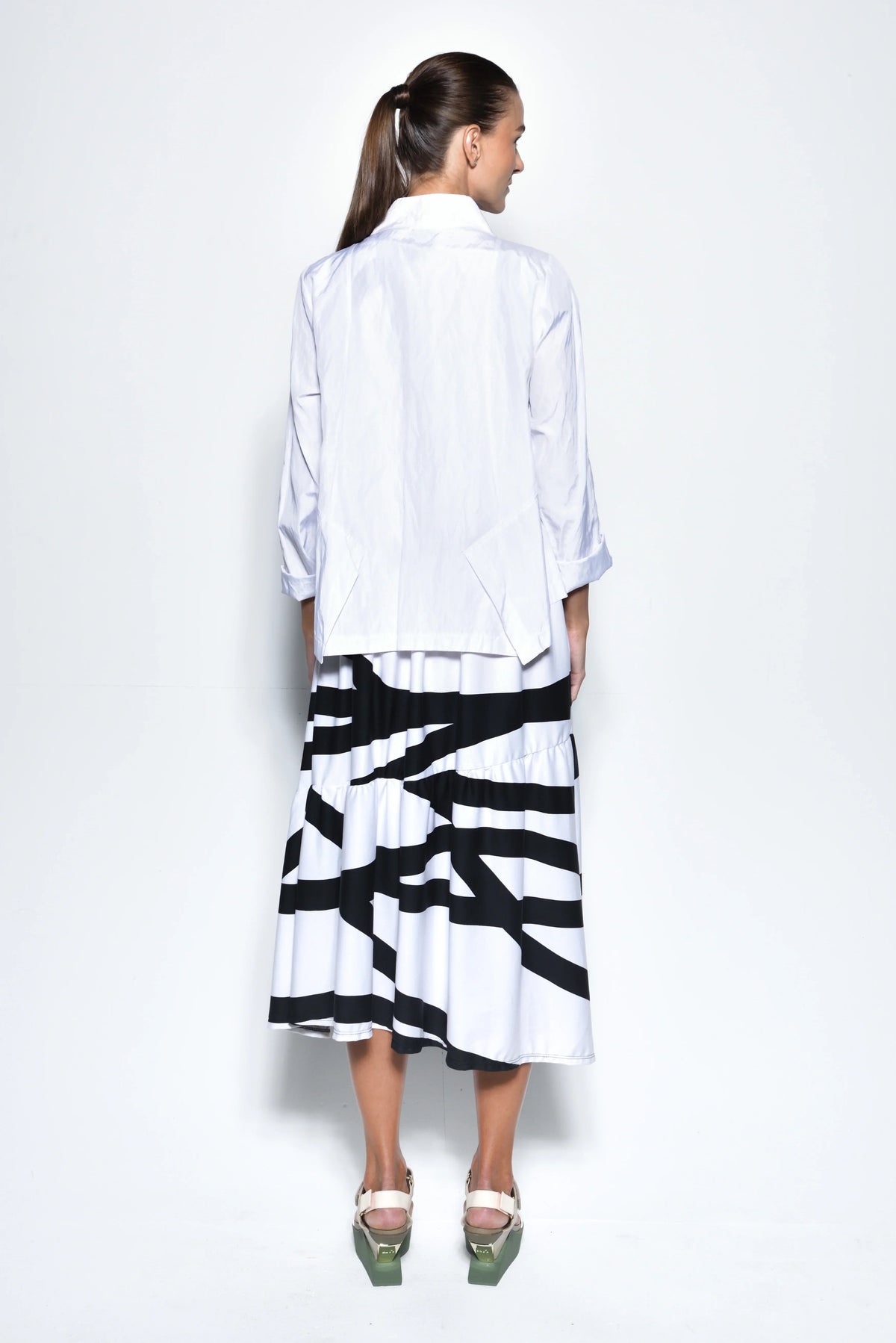 White Tokyo Jacket by SIMPLY MILA, modern women's jacket with sleek design and stylish fit, displayed on a plain background.