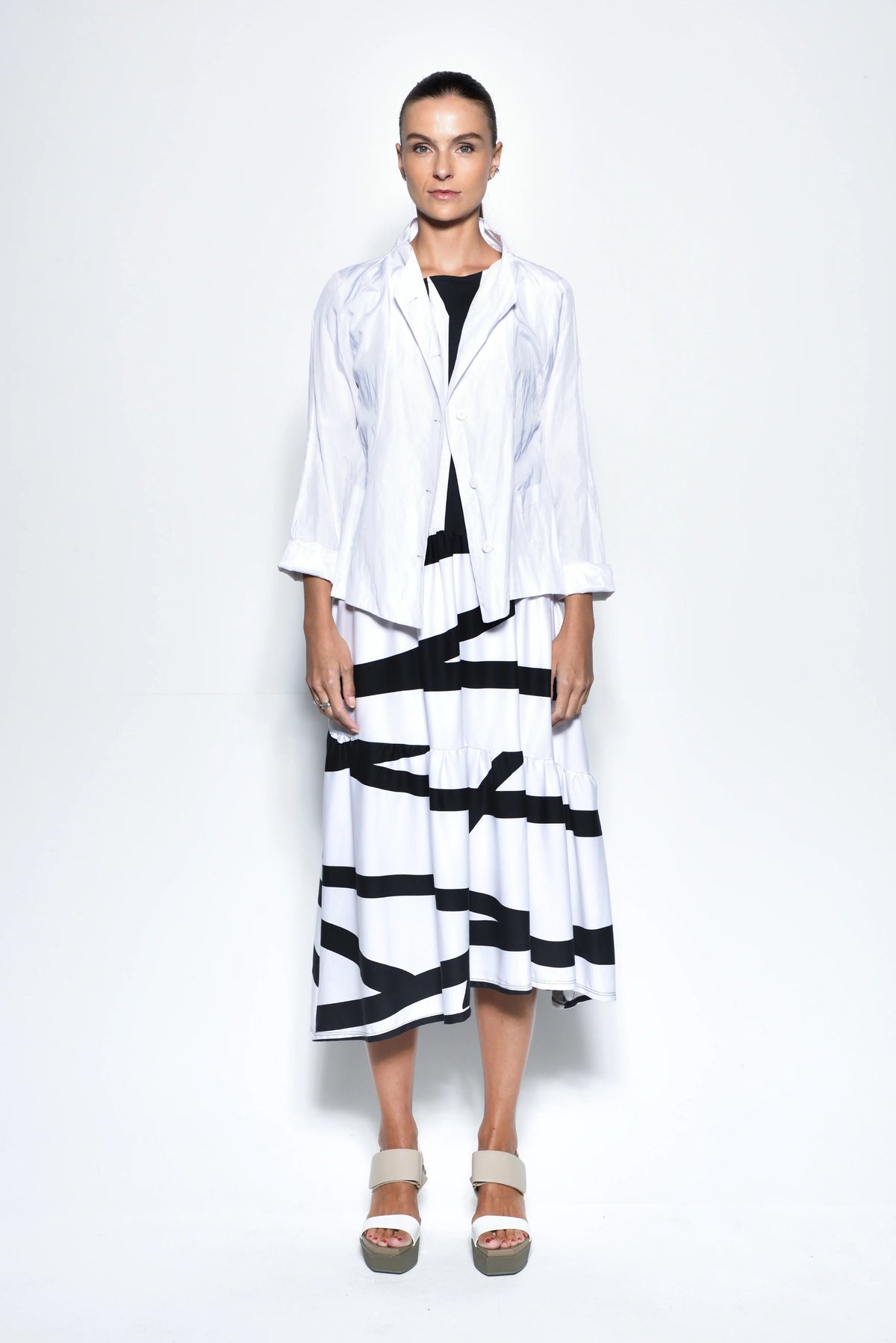 White Tokyo jacket by SIMPLY MILA Modern Women's Clothing, stylish lightweight jacket with a sleek fit and minimal design.