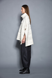 Gray Cable Poncho from SIMPLY MILA, a cozy modern women's clothing piece with a textured cable knit design.