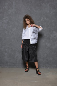 Boxy stroke-pattern shirt from SIMPLY MILA Modern Women's Clothing, featuring a loose fit and stylish design.