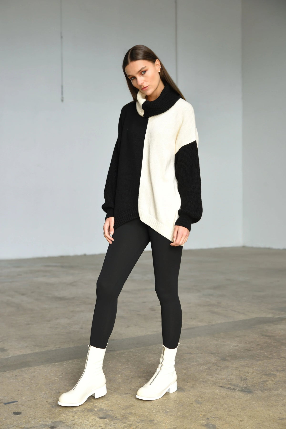 Simply Mila Ying Yan sweater, modern women's clothing, featuring soft knit fabric and stylish design in a close-up view.
