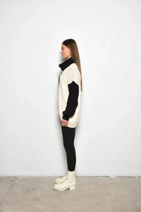 Ying Yan sweater from SIMPLY MILA, modern women's clothing, featuring a cozy knit design in neutral tones.