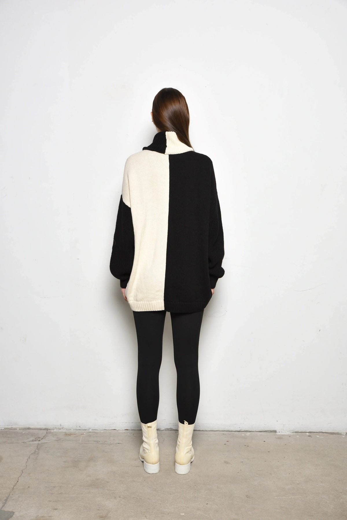 Simply Mila Ying Yan sweater, a stylish women's knit sweater in a cozy design, shown in a neutral color.