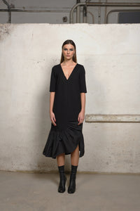 Simply Mila unbalance ruffle sweater dress, modern women's clothing, front view showcasing ruffle details and cozy fit.