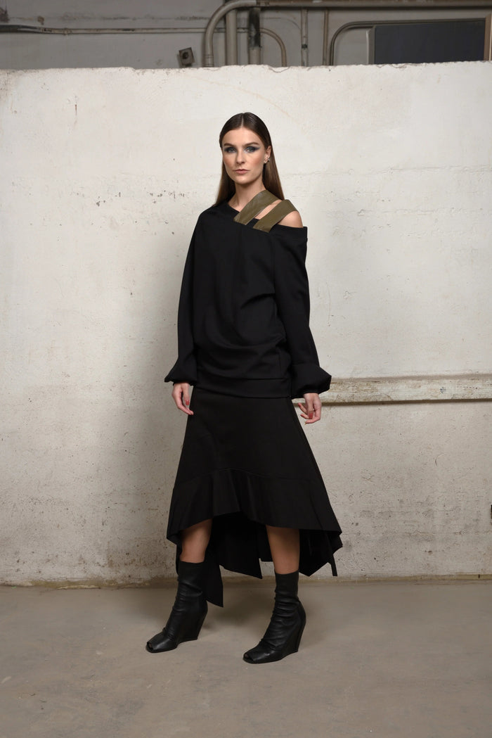 Asymmetrical sweater by SIMPLY MILA, modern women's clothing, showcasing a stylish, asymmetric design in soft knit fabric.