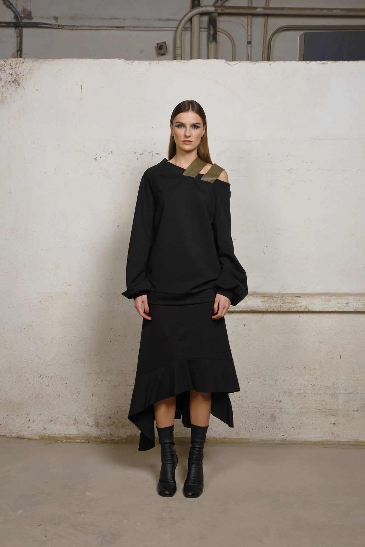 Asymmetrical sweater from Simply Mila, modern women's clothing, featuring a stylish design and soft knit fabric.