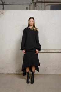 Asymmetrical sweater from Simply Mila, modern women's clothing, featuring a stylish design and soft knit fabric.