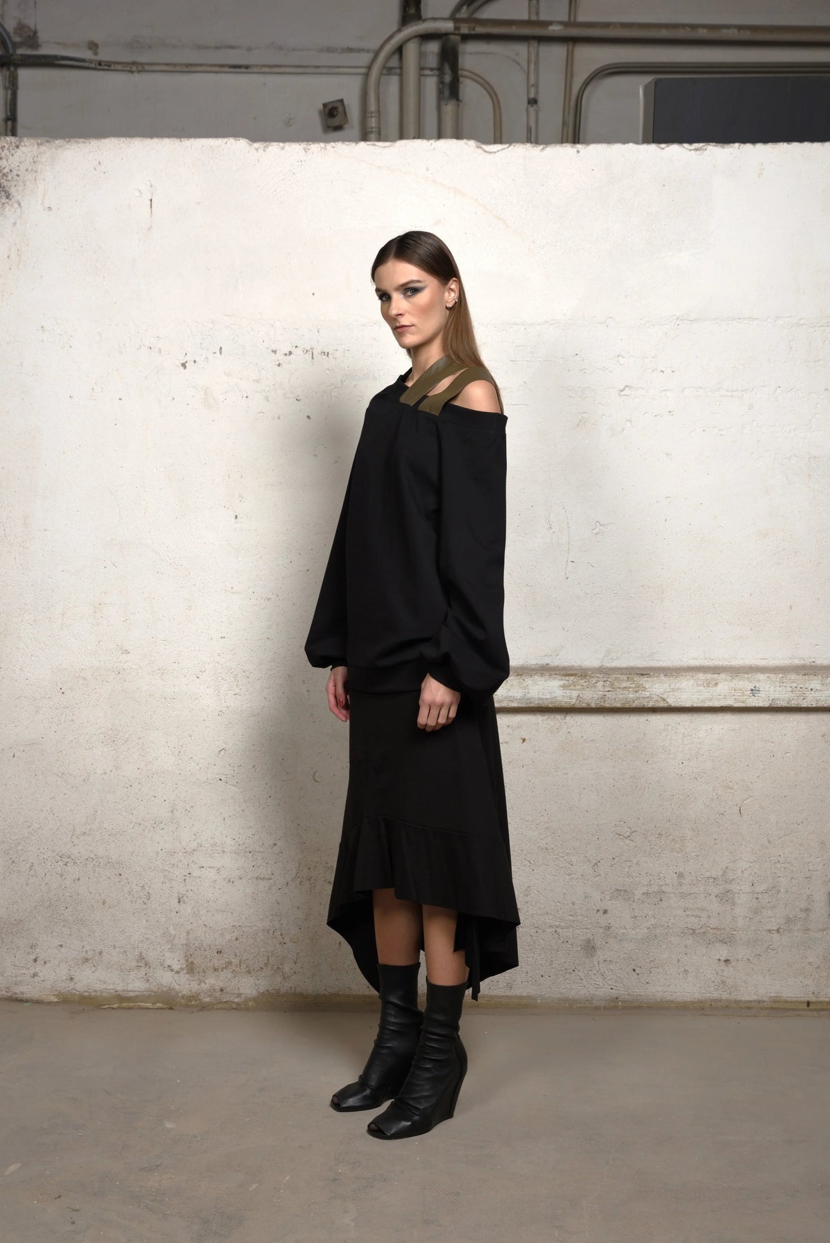 Asymmetrical sweater by Simply Mila, modern women's clothing, featuring a stylish asymmetric design and soft knit fabric.