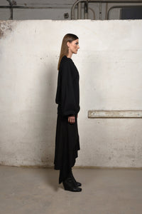 Asymmetrical sweater from Simply Mila, modern women's clothing, with a stylish irregular hem and cozy knit fabric.