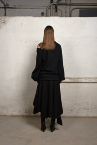 Stylish asymmetrical sweater by SIMPLY MILA, modern women's jumper with unique design and soft knit fabric, front view.