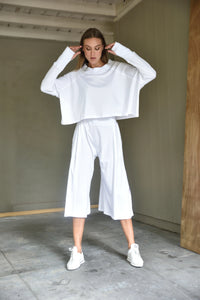 Elegant Zoe top from SIMPLY MILA Modern Women's Clothing, featuring a stylish design and comfortable fit.
