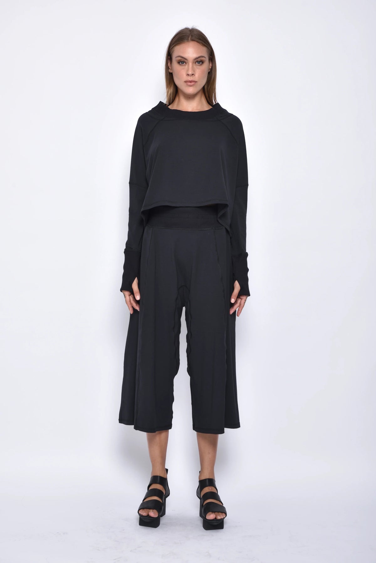 Front view of the SIMPLY MILA Zoe Top, a stylish women's clothing top with a modern design and comfortable fit.