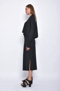 Side view of the SIMPLY MILA Zoe Top, a stylish women's blouse with a relaxed fit and modern design.