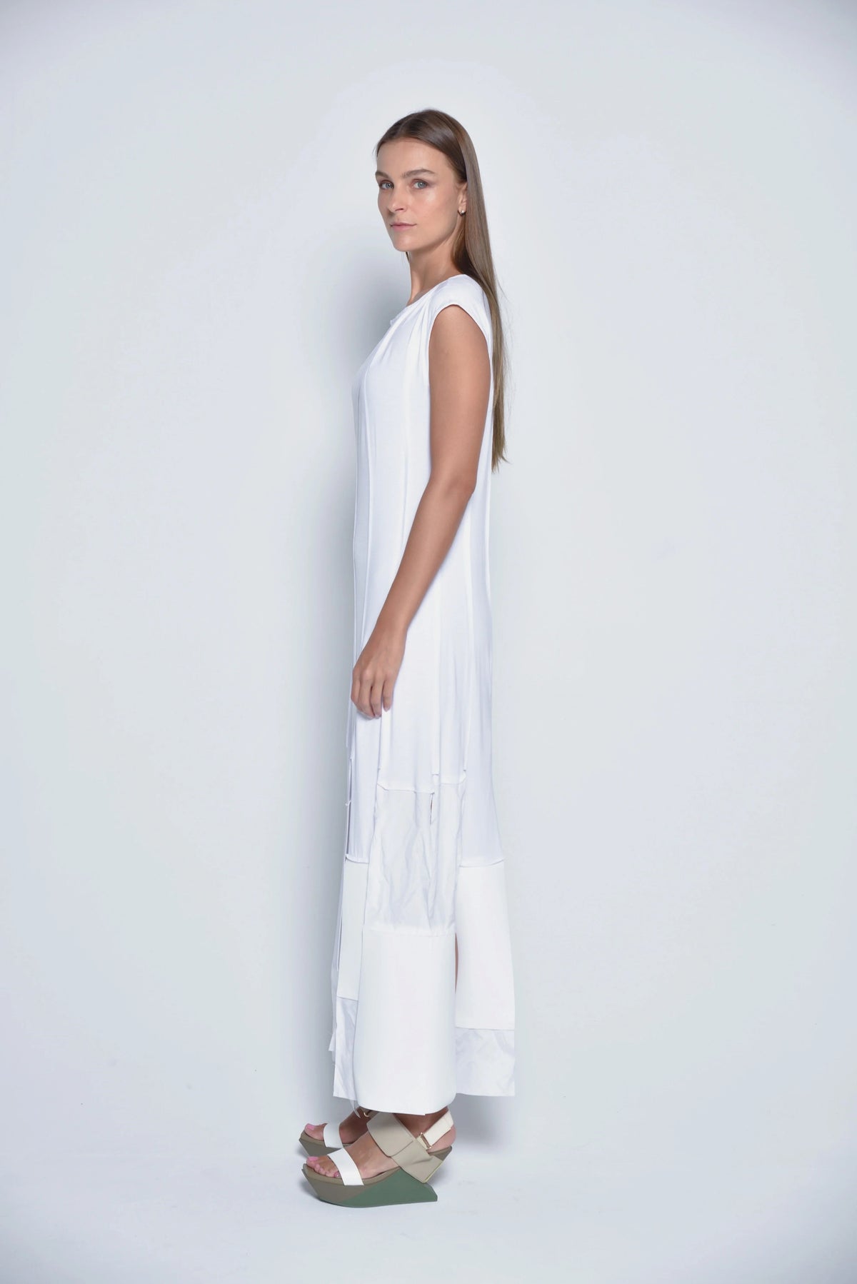 Simple black Motion Panel Maxi Dress from SIMPLY MILA Modern Women's Clothing displayed on a hanger.