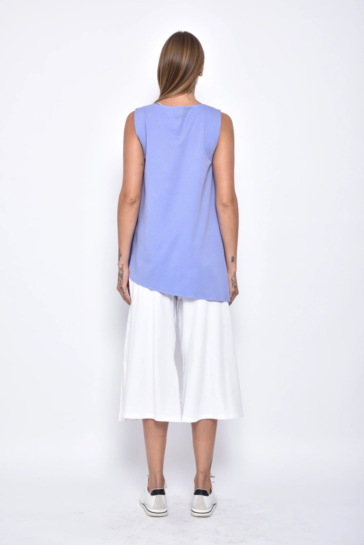 Back view of the SIMPLY MILA Tessa Top, a stylish women's blouse with a fitted silhouette and modern design.