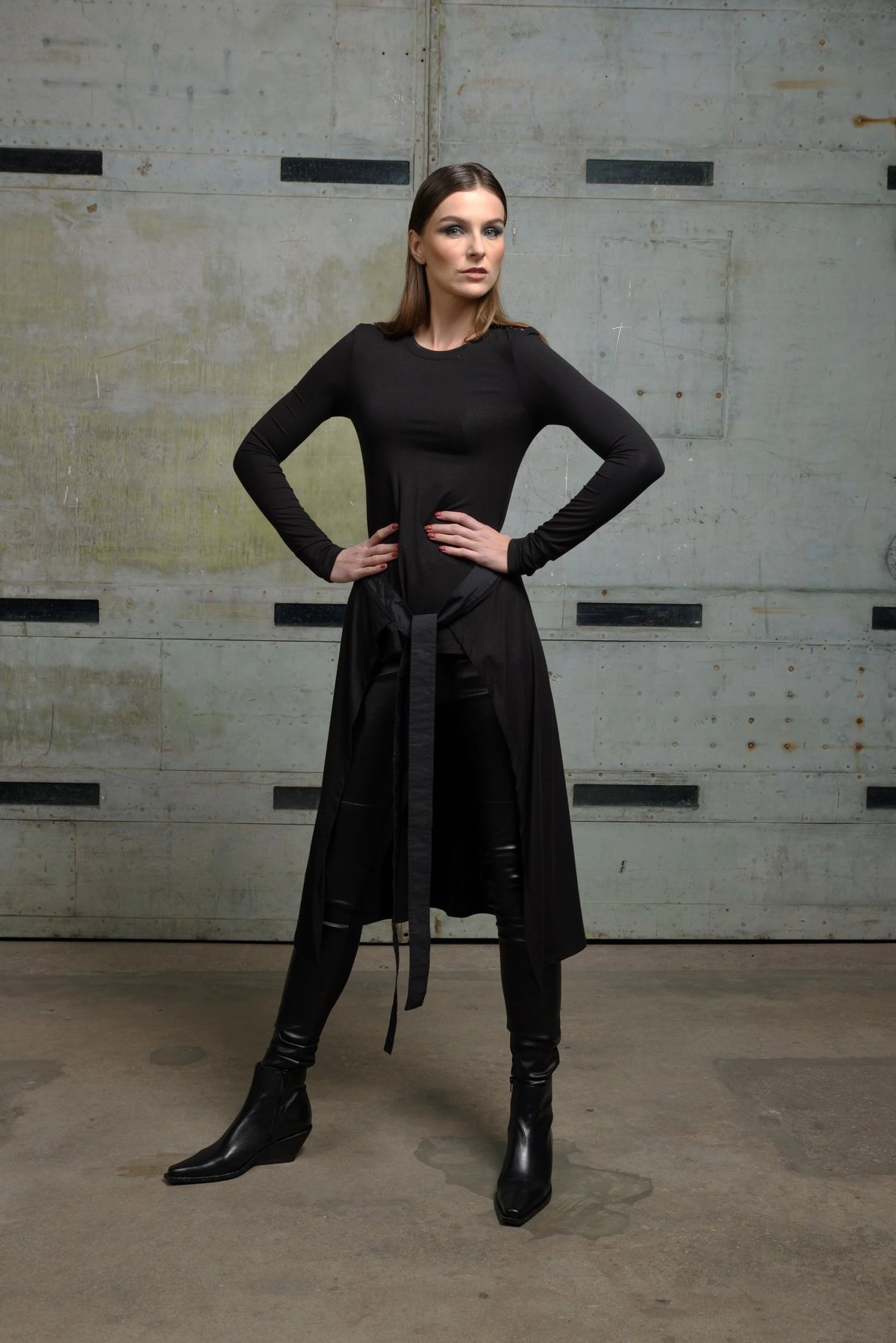 Simple apron top from SIMPLY MILA featuring a modern women's clothing design, displayed on a plain background.