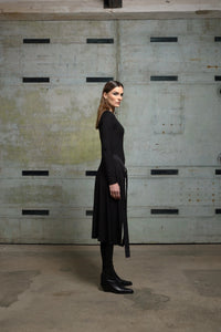 Simple apron top from SIMPLY MILA, modern women's clothing, featuring a stylish design and comfortable fit.