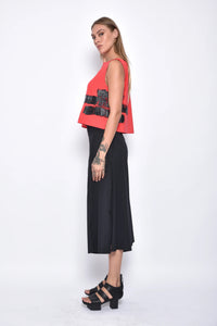 Simply Mila Dido top, modern women's clothing with a stylish design, shown on a model in a close-up image.