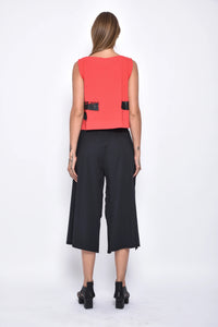 SIMPLY MILA Dido top, modern women's clothing, stylish sleeveless blouse in a vibrant color, displayed on a hanger.
