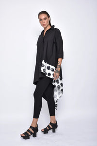 Asymmetrical tunic shirt from SIMPLY MILA, modern women's top with a stylish, uneven hem and relaxed fit, side view.