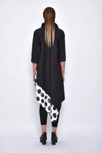 Back view of SIMPLY MILA modern women's asymmetrical tunic shirt with long sleeves and stylish drape, casual chic top for women.