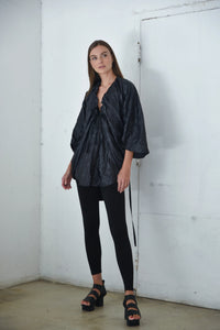 Light blue Mykonos tunic top by SIMPLY MILA, featuring flowing fabric and relaxed fit for modern women's casual style.